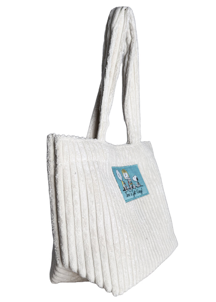 Peanuts Snoopy & Friends Corduroy Tote in offwhite with Snoopy friends woven patch on soft corduroy festival tote bag — side view