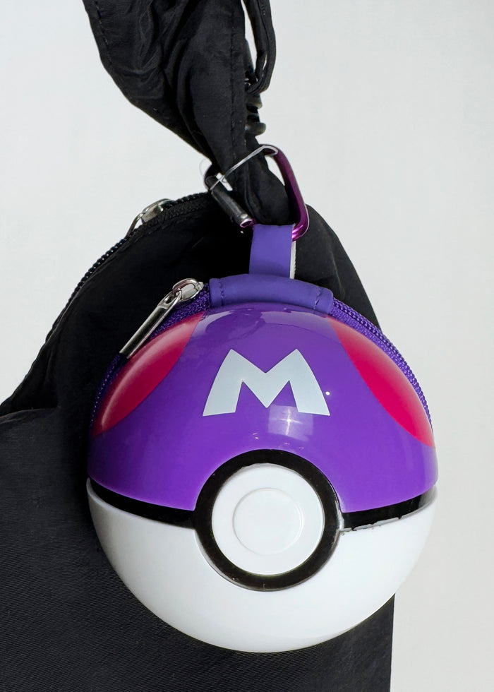 Pokemon 3D Master Ball Carabiner Zip Pouch in purple and white with carabiner clip and zipper closure — side view