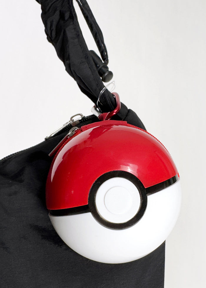 Pokemon 3D Poke Ball Carabiner Zip Pouch in red and white with carabiner clip and zipper closure — side view