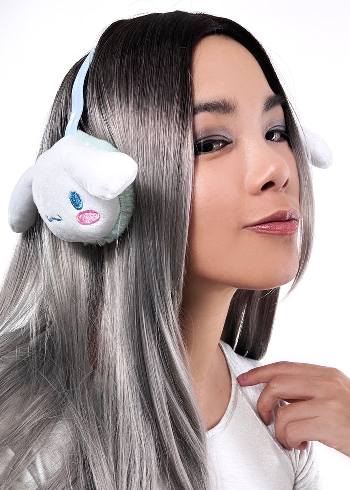 Sanrio Cinnamoroll 3D Plush Earmuff in white with 3D Cinnamoroll plush ear cups on rave festival earmuff accessory — model front view