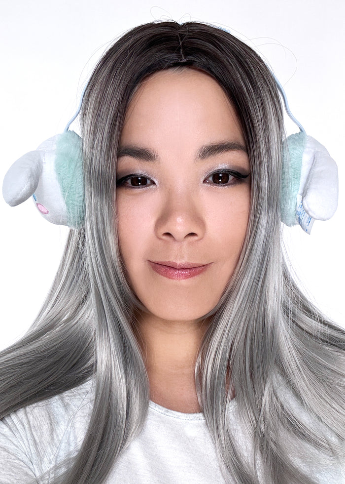 Sanrio Cinnamoroll 3D Plush Earmuff in white with 3D Cinnamoroll plush ear cups on rave festival earmuff accessory — model side view