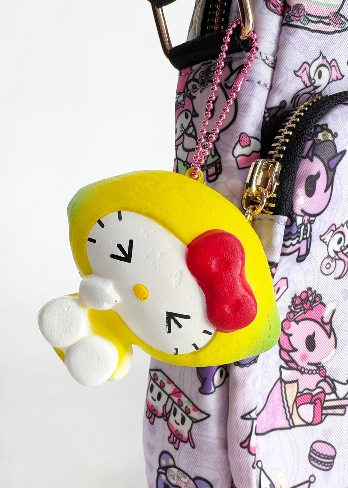 Sanrio Hello Kitty Lemon Mascot Keychain in yellow with Hello Kitty dressed as a lemon on soft plush mascot keychain — detail view