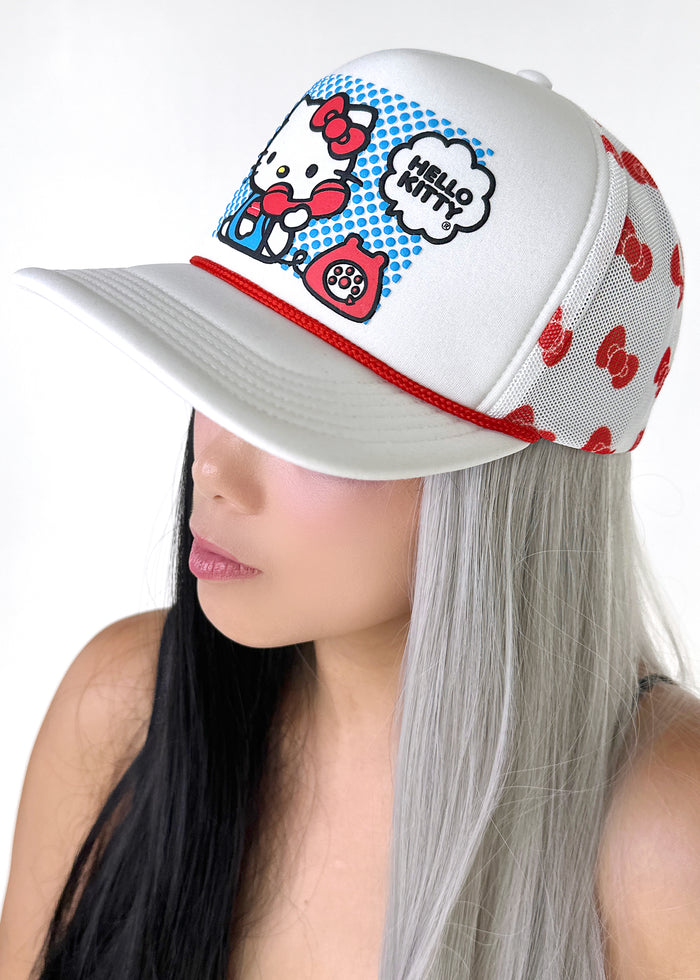 Bioworld Sanrio Hello Kitty Telephone Bow Mesh Trucker Hat in white red — model view