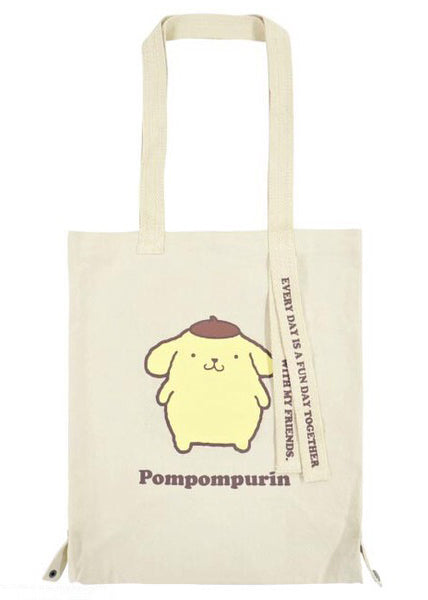 Sanrio Pompompurin Convertible Canvas Tote in yellow with Pompompurin print on 2-way convertible rave festival tote bag — front view