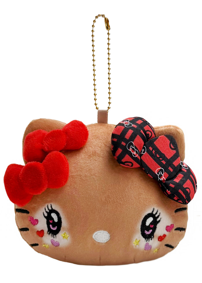 Sanrio Tanned Hello Kitty Student Face Plush Coin Pouch in brown with tanned Hello Kitty in student uniform on soft plush coin pouch — front view