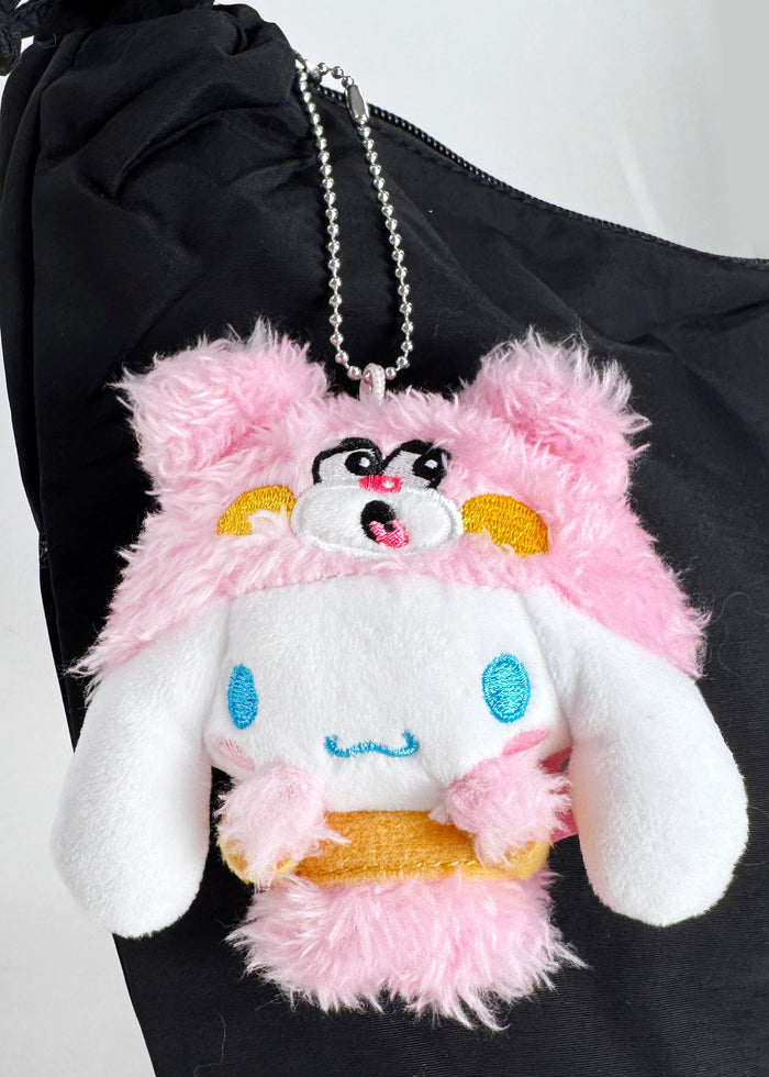 Sanrio X Skater Bento Box Cinnamoroll Plush Mascot Keychain in pink with Cinnamoroll in bento box design on plush festival keychain — model view