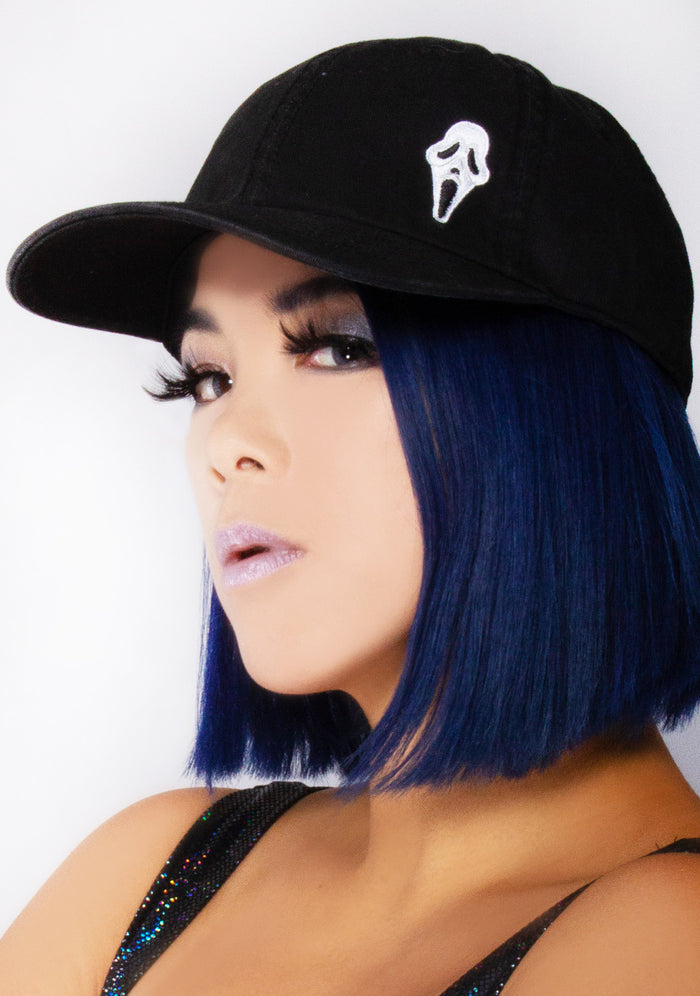 Bioworld Scream Ghostface Raglan Hat in black with embroidered Ghostface detail on horror fandom rave festival hat — model view