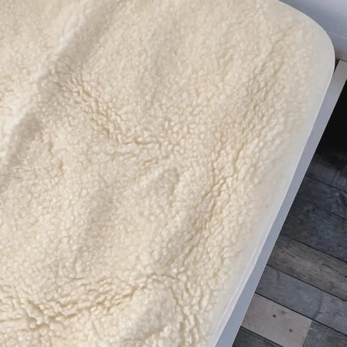 Protège matelas en laine vierge Sassoupi - 70x140cm