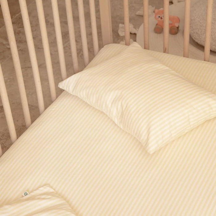 Taie d’oreiller bébé en coton bio Kadolis - Rayé jaune