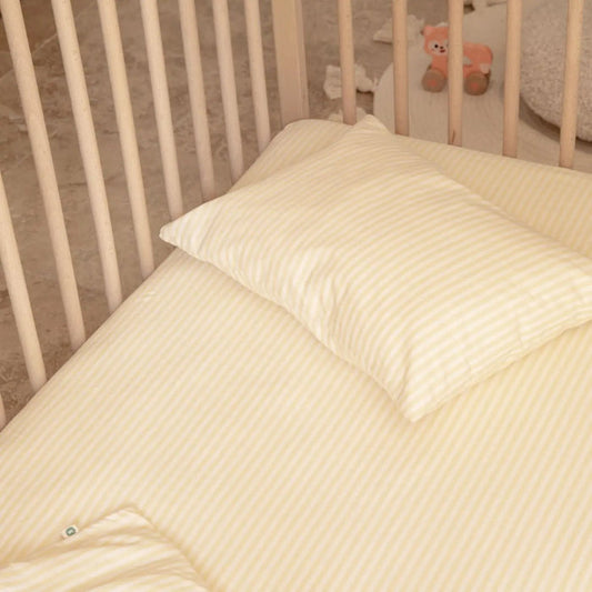 Taie d’oreiller bébé en coton bio Kadolis - Rayé jaune