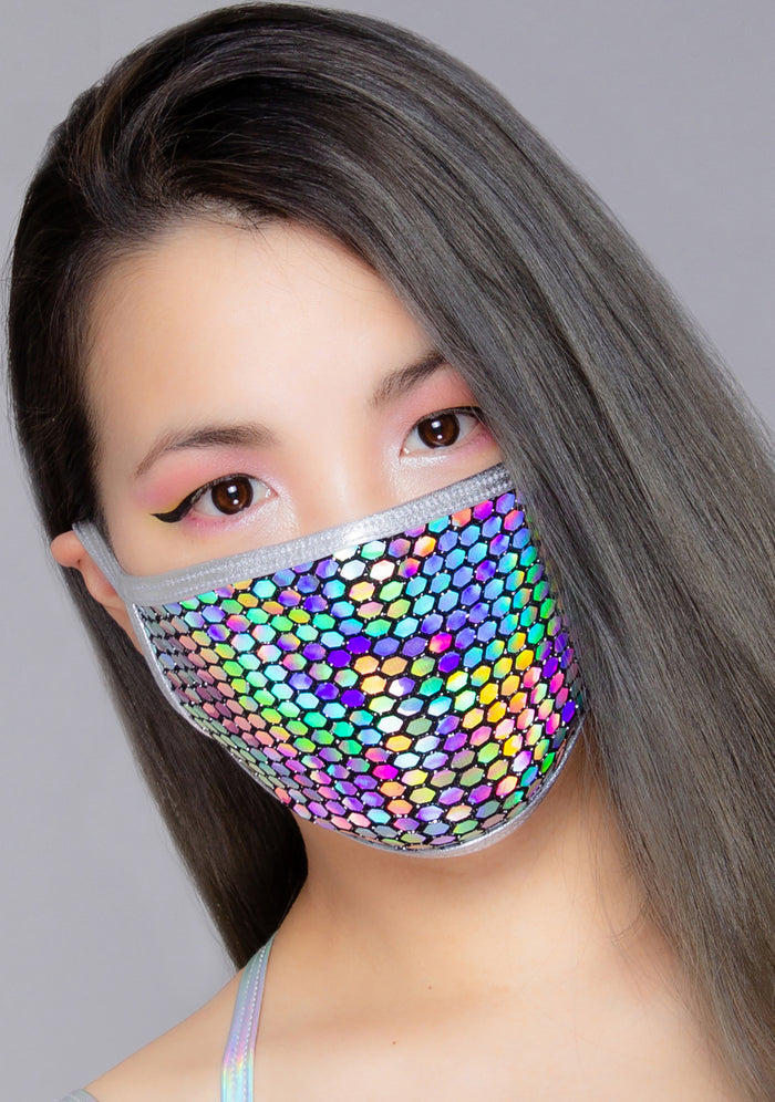 BGlittz Technicolor Dust Mask in metallic multi with honeycomb cut-out detail on breathable nylon rave festival face mask — model view