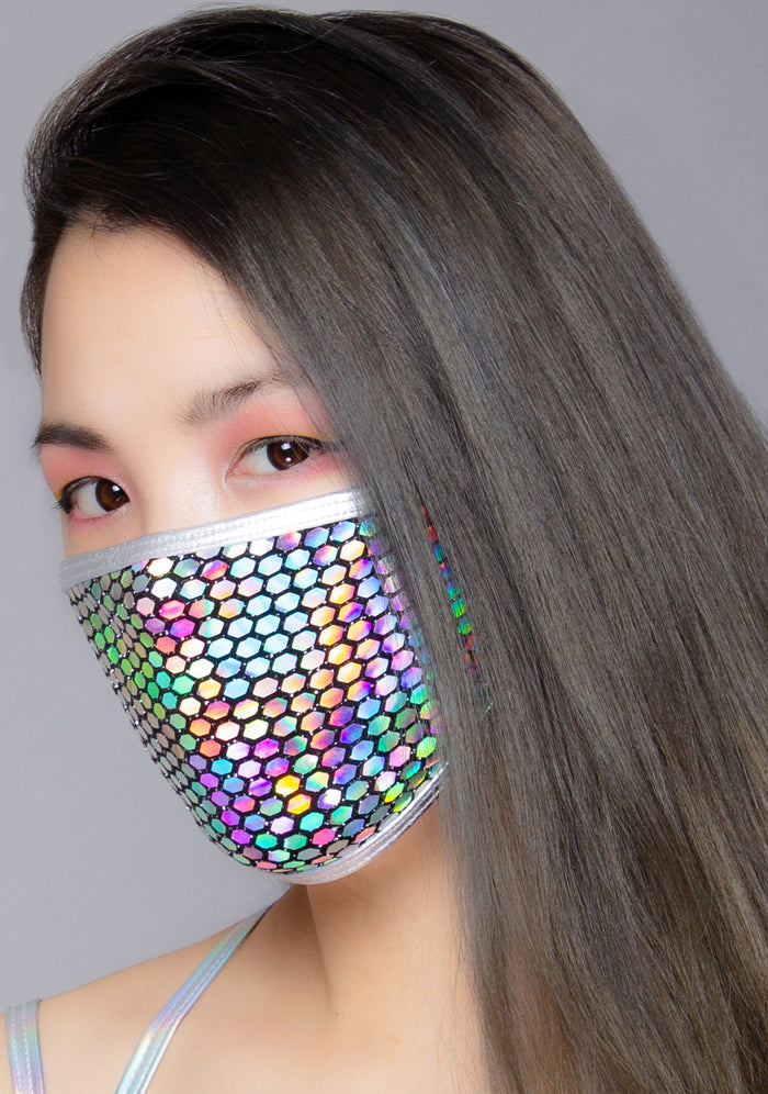 BGlittz Technicolor Dust Mask in metallic multi with honeycomb cut-out detail on breathable nylon rave festival face mask — model side view