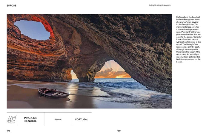 Cave entrance with a boat on a beach at Praia de Benagil, Portugal