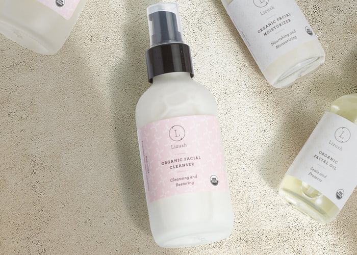 USDA Organic Facial Cleanser - Gentle natural face wash bottle | Lizush on a sand background