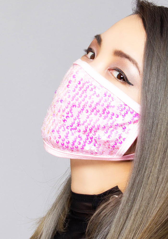 BGlittz Wanda Sequin Dust Mask in pink with full shimmering pink sequins on breathable nylon rave festival face mask — model view